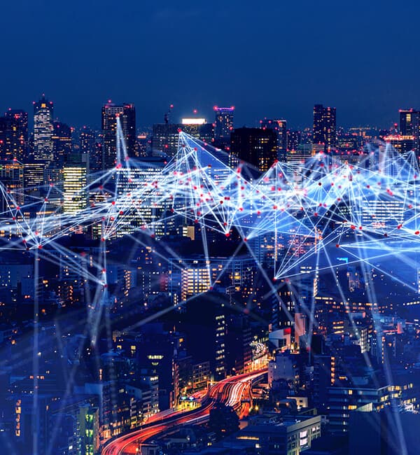 Business WAN Features 600x650 City at night with streams of lights all within the sky